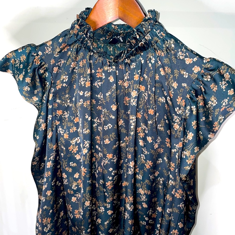 Green floral blouse